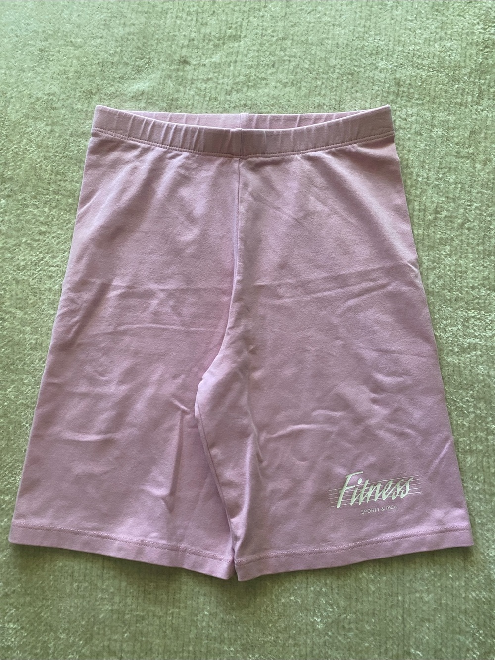 Sporty & Rich Light Pink Bike Shorts with White Logo Tag